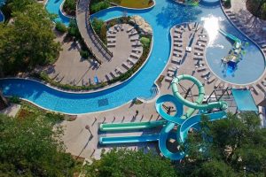 Hilton Anatole Jade Waterpark Pool Deck Installed by Texas Bomanite with Bomanite Sandscape Texture, Sandscape Refined and Shifting Sand Imprinted Concrete