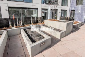 The Coloradan Outdoor Spaces Incorporate Bomanite Micro-Top ST a sand finish that is durable weather resistant and installed by Colorado Hardscapes