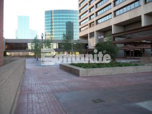Connecticut Bomanite Installs Bomanite Basketweave Brick and Bomacron Medium Ashlar Slate Patterns to Replace Old Worn out  Pavers in this Commerical Plaza and Pedestrian Bridge.