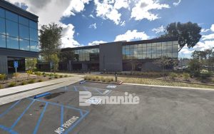 Bomanite Grasscrete Partially Concealed Pervious Concrete System is Installed by TB Penick as an Emergency Vehicle Access for Office Complex in Irvine California