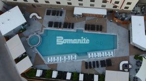 Hard Rock Casino located in Tulsa, OK makes waves with Bomanite Exposed Aggregate Alloy Finish for the Stylish, Architectural Concrete Pool Deck in two Bomanite Color Hardener and Integral Color Geometric shapes installed by Bomanite of Tulsa, Inc.