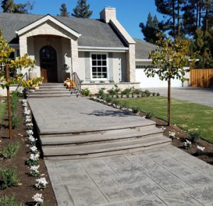 Interior Designer Lisa Davis worked with Heritage Bomanite for the Bomacron English Sidewalk Imprinted Concrete Driveway, Walkway and patio installations in Fresno, CA for this homeowners exterior hardscape plan