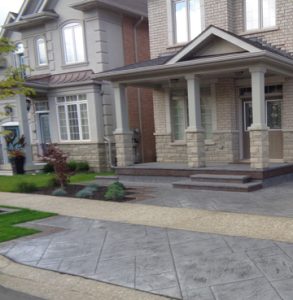 Canadian Homeowners Invest in Bomanite Decorative Concrete with an installation by Bomanite Toronto using the Yorkshire Stone Pattern for their Driveway and Patio in Burlington, Ontario Canada