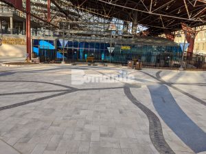 St. Louis Aquarium at Union Station Creates River of Glass with Bomanite Revealed Exposed Aggregate for the River Confluence created by PGAV Destinations and installed by Musselman & Hall Contractors for the Aquarium Train Station Themed Entry Way
