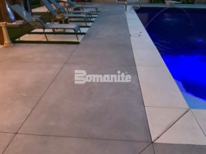 Concrete Arts, Inc. had the opportunity to create a stunning transformation for the homeowners backyard renovation with the Bomanite Revealed Exposed Aggregate System supplying a slip-resistant, durable pool deck that caters to daytime relaxation and upscale evening gatherings