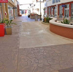 Tanger Outlets Opened their Fort Worth Location with Texas Themed Walkways Using Bomanite Imprint Systems throughout the hi-end shopping center installed by Texas Bomanite with design by Adams & Associates