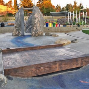 Downtown Bellevue Park Designs Inspiration Playground using Bomanite Decorative Concrete from Belarde Company, Washington forming a Concrete Bridge for the Splash Pad