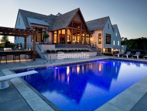 Luxury Home Builder, Hendel Homes chose Bomanite Licensee Concrete Arts for the spacious pool deck installation for their clients modern Tudor style new home, using Bomanite Sandscape Refined Antico Exposed Aggregate provides them with the sophistication and safety desired.