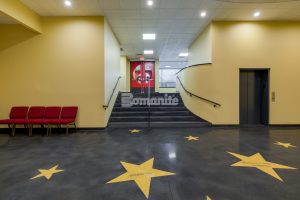 Premier Concrete Construction brought to life the Hollywood walk of fame in the main lobby of the Jaffrey Park Theatre with a sleek dark Bomanite Renaissance Polished Concrete Floor as the background to the Golden Stars engraved with donor names in brilliant blue created with the Bomanite Modena TG system.