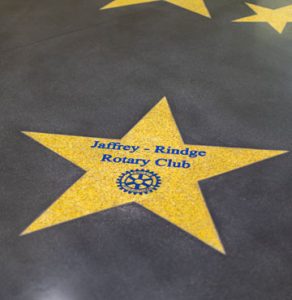 Premier Concrete Construction brought to life the Hollywood walk of fame in the main lobby of the Jaffrey Park Theatre with a sleek dark Bomanite Renaissance Polished Concrete Floor as the background to the Golden Stars engraved with donor names in brilliant blue created with the Bomanite Modena TG system.
