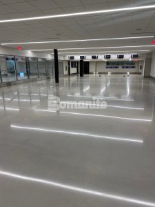 Brownsville International Airport Renovates Passenger Terminal with Bomanite Modena SL Custom Polished Concrete in Nickel Gray installed by Texas Bomanite Licensed Contractor