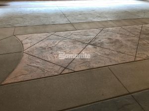 Monarch Casino Black Hawk Colorado Built a Luxury Port Cochere with Radiant Heat System installed under a Bomanite Decorative Imprinted Concrete Flooring in a Slate Texture with warm color tones provided by Bomanite Licensee Colorado Hardscapes