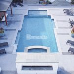 Bomanite Licensee Bomanite of Tulsa installed over 2,500 SF of Bomanite Revealed and Bomanite Alloy to create decorative concrete pool decking for homeowners.