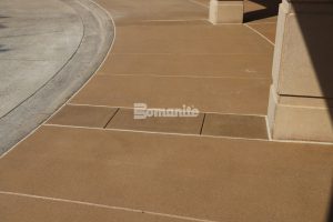 The entry walkway at the Stowers Institute medical research facility features Bomanite Sandscape Texture decorative concrete.