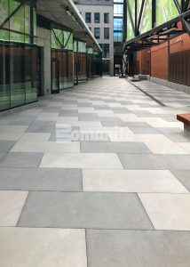 Colorado Hardscapes created a stunning paseo at Market Station using Bomanite Sandscape Texture decorative concrete paired with Bomanite Ebony Chemical Stain. 