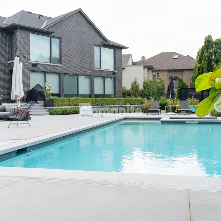 Bomanite Toronto installed stunning decorative concrete at a private residence using Bomanite Exposed Aggregate Systems with Bomanite Sandscape Refined and Bomanite Sandscape Texture.