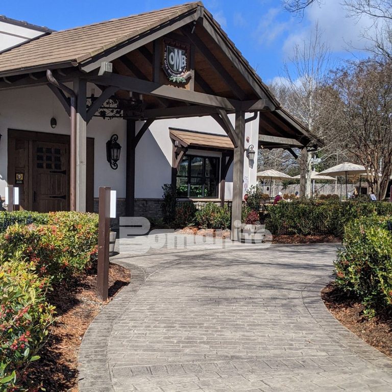 Carolina Bomanite enhanced the grand entrance at Olde Mecklenburg Brewery in Charlotte, North Carolina by installing Bomanite Imprint Systems featuring the Running Bond Belgian Block pattern.