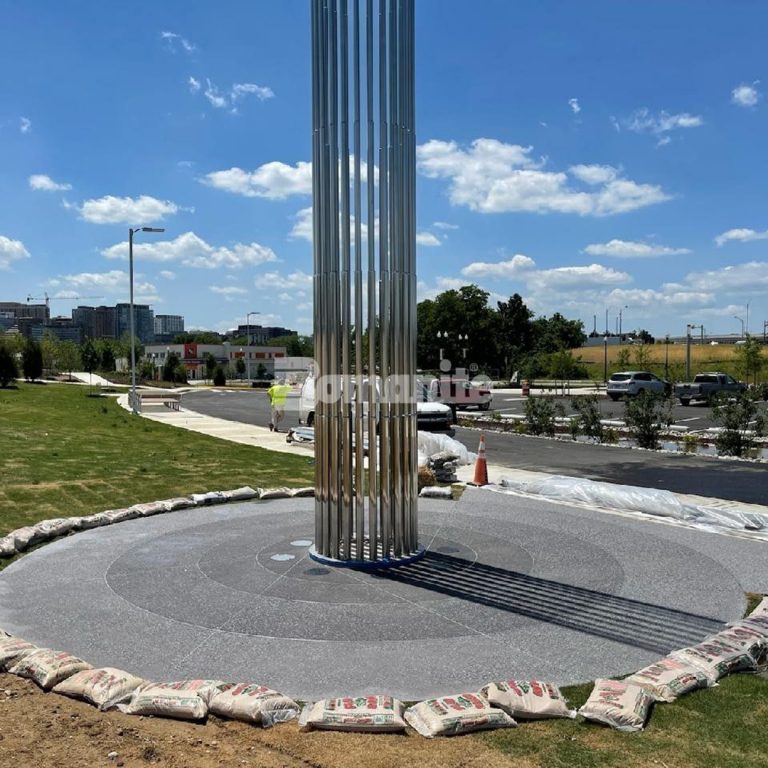 Beyond Concrete created a custom Bomanite Revealed installed at Sky Column sculpture in Arlington, VA.