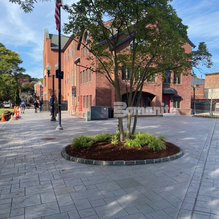 Sidewalks featuring Medium Ashlar Slate and Soldier Course Belgian Block patterns decorative concrete Bomanite Imprint Systems.