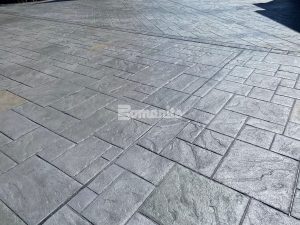 Sidewalks featuring Medium Ashlar Slate and Soldier Course Belgian Block patterns decorative concrete Bomanite Imprint Systems.