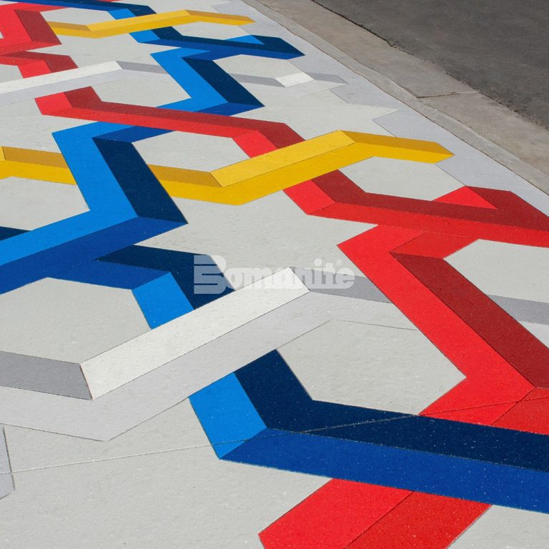 The RYE SoBo apartment complex boasts a beautiful Bomanite Micro-Top XT artistic display as well as Bomanite Sandscape Texture decorative concrete sidewalks.
