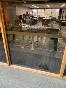 Stephens and Smith installed Bomanite Micro-Top to create a conference table that provides the illusion of a heavily reinforced slab with a unique mottled finish.