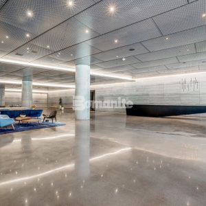 Texas Bomanite installs Bomanite Patène Teres custom polished concrete to transform the flooring in the office tower entry area at The Epic in Dallas, Texas.
