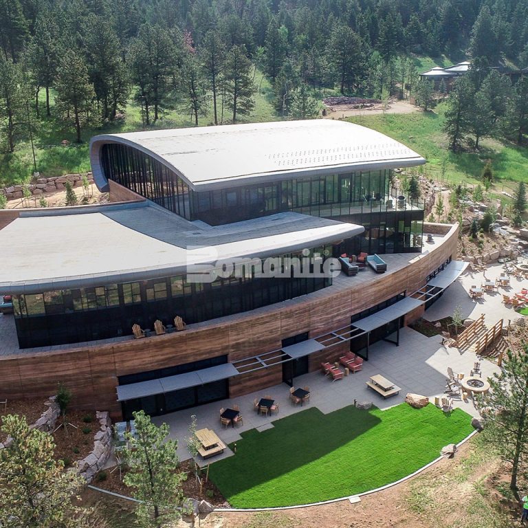 Lone Rock Retreat in Bailey, CO, showcases a stunning installation of Bomanite Sandscape decorative concrete that was expertly installed by Colorado Hardscapes.