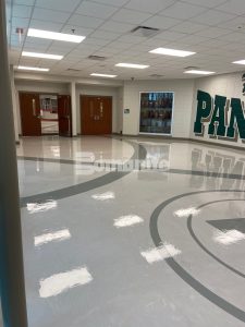 Jeffco Concrete created Bomanite Micro-Top decorative concrete logo flooring at Pelham High School in Pelham, AL.
