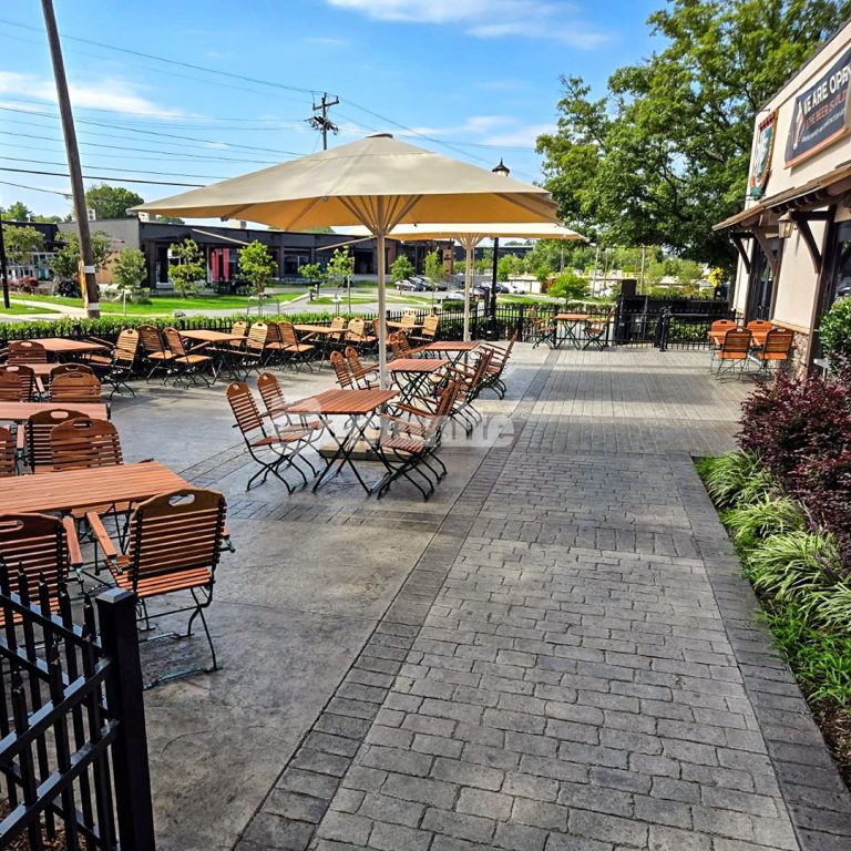 Decorative concrete brewery patio featuring Bomanite Slate Texture and Bomanite Belgian Block Border by Carolina Bomanite.