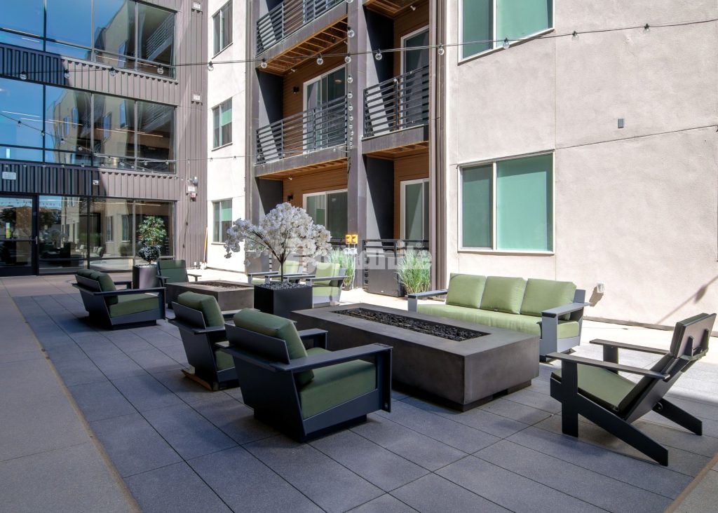 Bomanite Sandscape Texture at Enso Zen Apartments installed by Colorado Hardscapes in Denver, CO.
